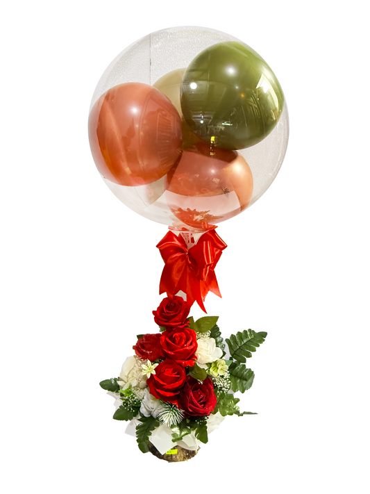 Arreglo de rosas artificiales con globo burbuja